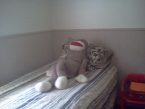 Here's Sock Monkey resting in his room in NY, in preparation for his trip west.